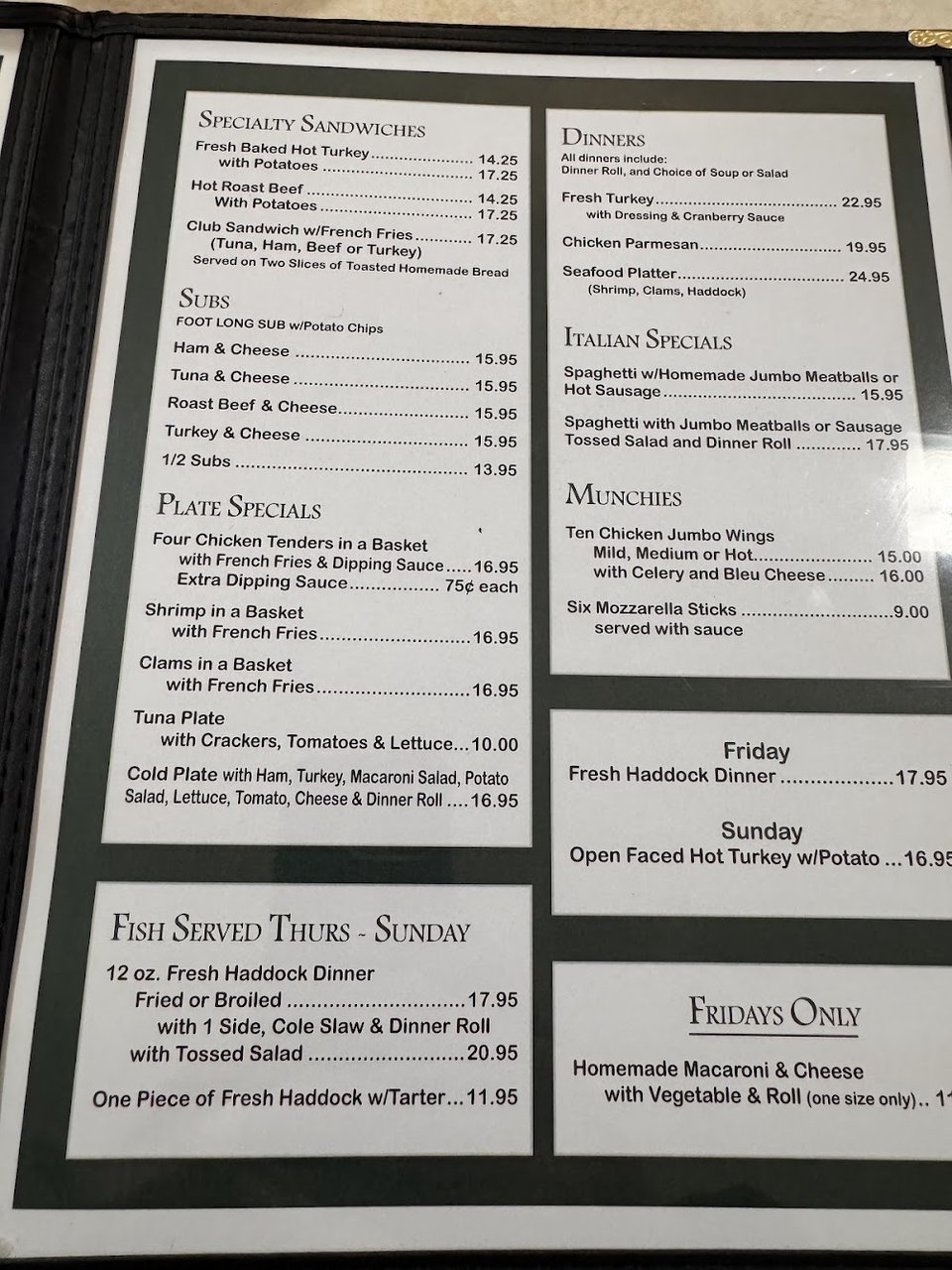 Sandwiches, salads, and soups on display.